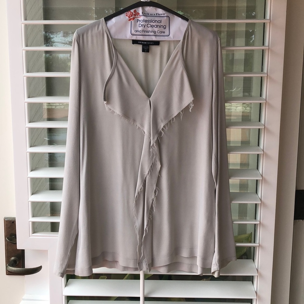 Formal meets fray blouse.